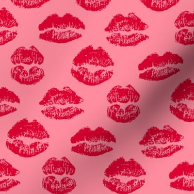 Red kisses for lovers on light pink