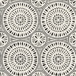spinning - creamy white_ raisin black - hand drawn circle tile