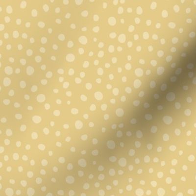 Pastel light yellow polka dots on honey gold yellow_ dual tone monochrome, small polka dots