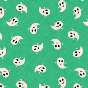 Cute cream white ghosts on a textured mint green. Great for kids Halloween apparel