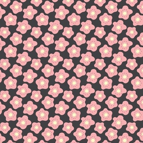 Pink Flowers with Pale Yellow Centers on Charcoal