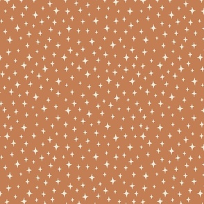 CLASSIC SMALL SCALE DITSY STARS IN ORANGE RUST AND OFF WHITE