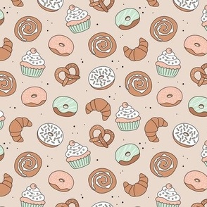 The german bakery - pretzels croissants donuts cupcakes and cinnamon buns sugary snacks for breakfast blush mint on sand soft pastel neutral palette SMALL