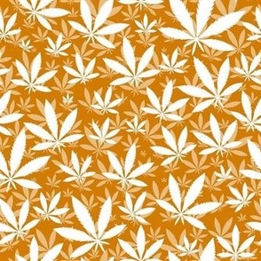 Smaller Scale Marijuana Cannabis Leaves White on Sunset Burnt Orange