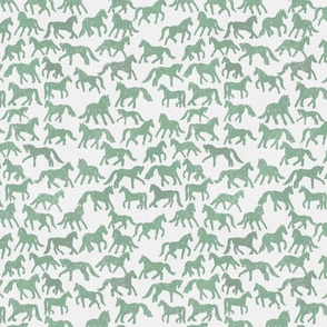 green and white faded horses