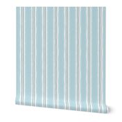 hand painted linen ticking stripe large wallpaper scale in warm washed linen duck egg blue neutral by Pippa Shaw