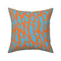 80´s flash pattern in baby blue on an orange background