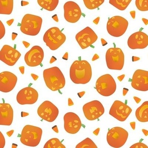 Tossed Laughing Funny Halloween Pumpkins with Light Orange Faces and Candy Corn on White Background Non Directional Medium