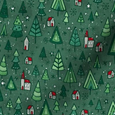 Snowy Christmas trees and houses on a green background 