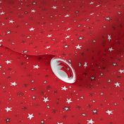 Stars and snow on a red background