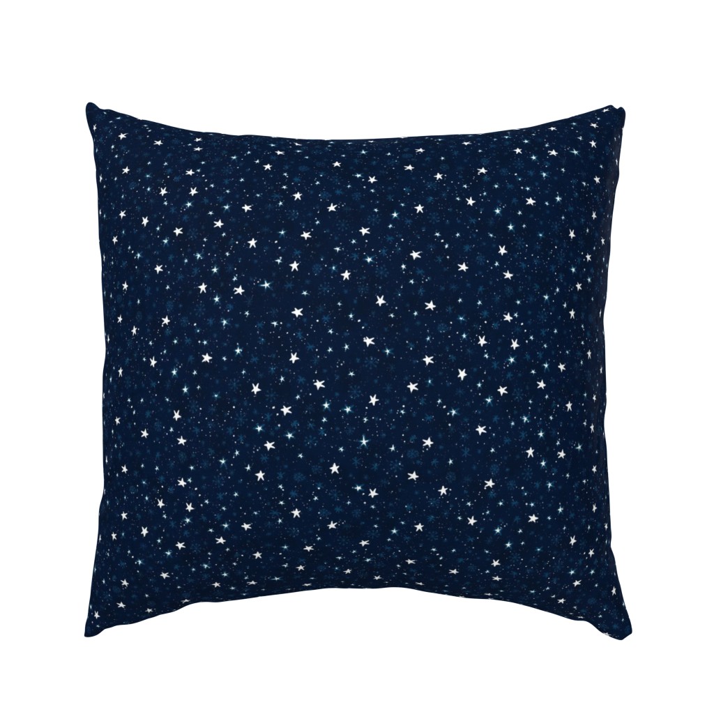 Stars and snow on a blue background