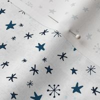 Stars and snow on a white background