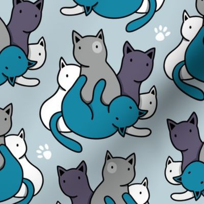 Funny kittens on a blue background