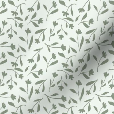 Tossed olive green flower silhouettes on cream background