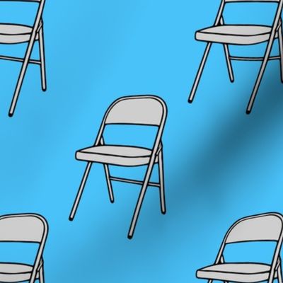 Large Scale Folding Chair on Blue