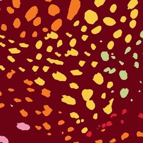 Paint splatters abstract swirl pattern on burgundy / maroon - watercolor hand-painted colorful spots & polka dots in red yellow orange pink green