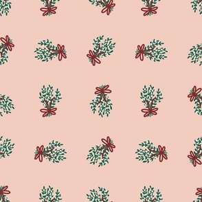 Emerald Green Mistletoe with Rich Crimson Red Bows on Light Pink