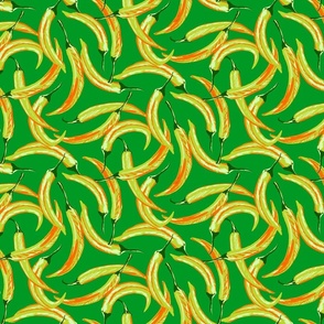 HAND DRAWN TOSSED CHILLIS IN GREEN AND ORANGE ON GREEN