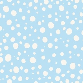 polka dots cream on pastel light blue
