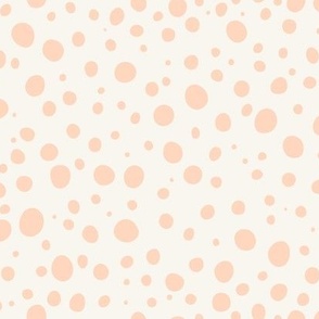 polka dots pastel orange on cream