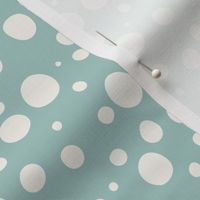 polka dots cream on muted light blue