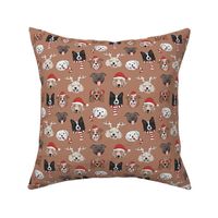 Christmas dogs - cute dressed up holiday puppies with antlers santa hats candy cane and sinter scarf and mittens on latte brown 