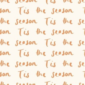 orange tis the season festive Christmas saying on off-white