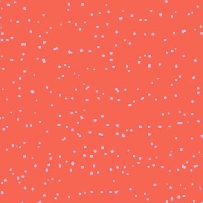 Purple speckles on coral pink