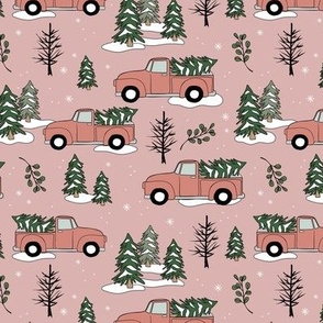 Driving home for Christmas - Winter wonderland christmas pine trees and pick up cars driving in the forest vintage blush coral on pink