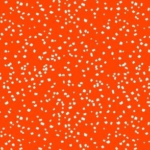 confetti cream on bright orange