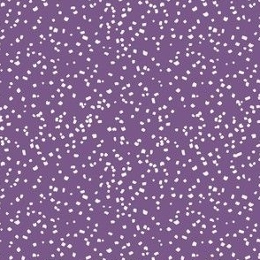 confetti cream on muted purple