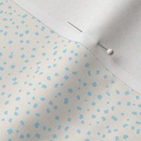 confetti pastel light blue on cream