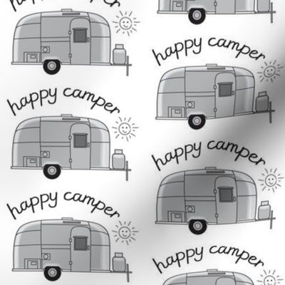 large vintage silver trailers with happy camper sun