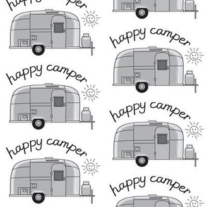 large vintage silver trailers with happy camper sun