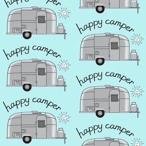 large happy camper aluminum trailers on blue