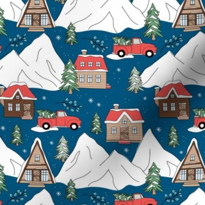 Vintage Christmas- Mountain cabins and christmas trees driving home for Christmas seasonal winter wonderland and snowy mountain peaks red on navy blue