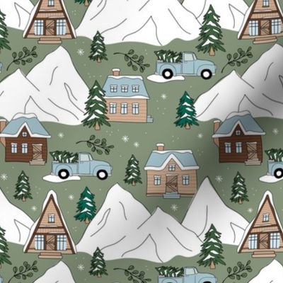 Vintage Christmas- Mountain cabins and christmas trees driving home for Christmas seasonal winter wonderland and snowy mountain peaks brown beige moody blue on olive green