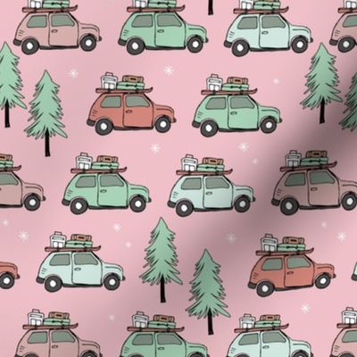 Vintage Christmas cars - driving home for christmas seasonal retro car design with christmas presents and snowflakes coral mint green on pink