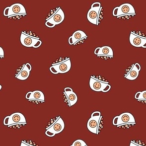 Cutesy Christmas hot chocolate and coffee cups and smileys with little marshmallows candy retro kids design on burgundy red