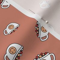 Cutesy Christmas hot chocolate and coffee cups and smileys with little marshmallows candy retro kids design on vintage red
