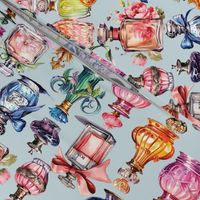 Parisian Perfume Gems – French Blue Background Wallpaper 