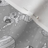 Astronauts in outer space light gray - cosmonauts exploring galaxies and planets - small scale 