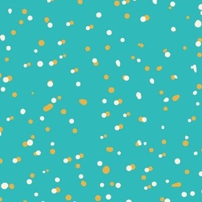 Yellow and blue tossed dots, yellow and cream white dots randomly scattered across teal background