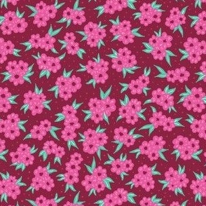 Pink and mint ditsy florals on burgundy red