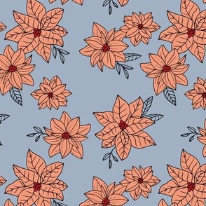 Vintage poinsettia flowers - Christmas boho blossom floral design with leaves peach orange on moody blue