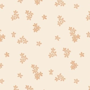 Small ditsy flowers in cream