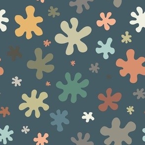 Cute hand drawn playful scattered splash blobs in dark blue grey and earth tones