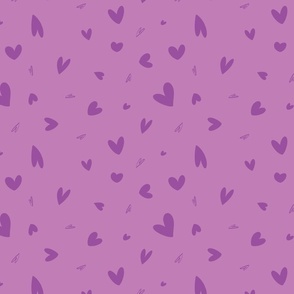 Hand drawn tossed hearts in lilac and radiant orchid violet