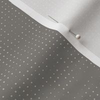 Halftone polka dots in taupe grey and silver grey