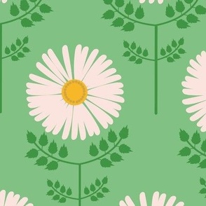 Large-scale sweet daisy print in colors of golden yellow, orange, pink, and green. 
